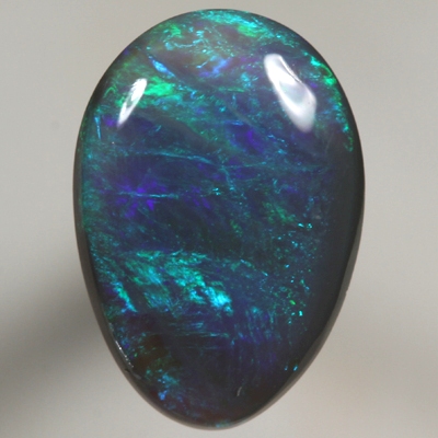 SOLID SEMI BLACK OPAL Bright and rich green and turquoise over blue
